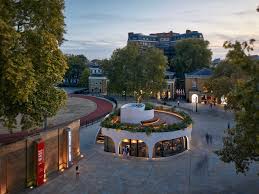 Around the cafe perimeter walls, there are some seating benches that change into a comfortable couch with shelves. Imagine A Cafe Turning Into A Piazza Hirt Moving Architecture