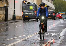 Image result for rain cyclist