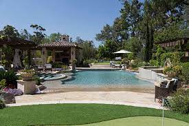 Welcome To The Ultimate Backyard Oasis Complete With A Large Rectangle Pool With Local Flagstone Beach Entry Multiple Water Rectangle Pool Pool Finishes Pool