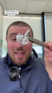 Two Tone Oval Cathedral Engagement Ring