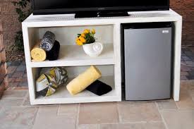 Modern And Sleek Check Out This Tv Stand That Somers Furniture Designed Not Only Does It Work Perfectly For Storag Cool Dorm Rooms Home Gym Decor Mini Fridge