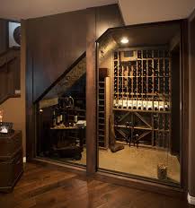 If it has its own entrance (or the potential for one) you can toss a kitchenette, bathroom, and bedroom down there and rent it out. More Than A Man Cave Basement Development Eklektisch Weinkeller Calgary Von Malbec Homes Renovations Inc Houzz
