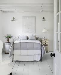 Weathered shutters add a touch of shabby chic flair to this cozy gray and white bedroom from decor gold designs. 45 Best White Bedroom Ideas How To Decorate A White Bedroom