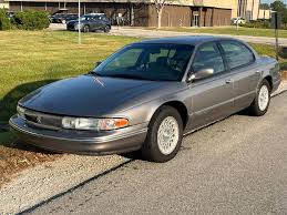 Image result for Medium Driftwood 1994 Chrysler