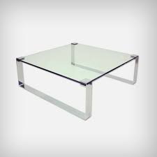 Effortlessly elegant and refined, this rectangular coffee table proves functionality doesn't mean compromising on style. German Chrome Glass Coffee Table Model Klassik 1022 By Peter Draenert 1960s 160390