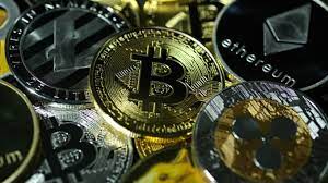 A cryptocurrency, broadly defined, is currency that takes the form of tokens or coins and exists on a distributed and decentralized ledger. Cryptocurrencies Should Be Regulated Says Boss Of Central Bank Group