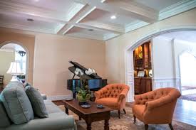 Rich gray walls are paired with neutral furnishings and a gray graphic area rug. Arch Designs That Can Elevate Your Home Decor Laptrinhx News