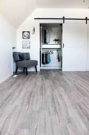 Transforming A Space By Installing Vinyl Plank Flooring Grey Vinyl Plank Flooring Flooring Vinyl Plank Flooring