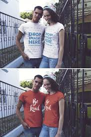 Placeit Young Couple Smiling While Wearing T Shirts Mockup With Different Designs On The Street Shirt Mockup Clothing Mockup Hoodie Mockup