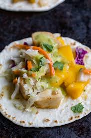 Beer battered cod are the star of these fresh and tasty fish tacos, served in corn tortillas with shredded cabbage and a zesty white sauce. Blackstone Fish Tacos With Peach Salsa Or Whatever You Do