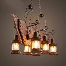 Hartsock 6 Light Lantern Linear Pendant With Wrought Iron Accents In 2020 Wooden Chandelier Rustic Light Fixtures Industrial Light Fixtures