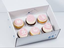 Its frosting flourishes are easy to pipe on, and the airy cake base leaves room for a second slice. Baby Shower Christening Cupcakes