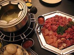 How To Do Meat Fondue Serving Fondue Is A Great Way To Boost Conversation At Your Next Dinner Party O Fondue Dinner Chicken Fondue Recipes Fondue Recipes Meat
