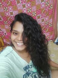 Polly was a slim girl of nineteen; she had light soft hair and a small full  mouth. Her eyes, which were grey with a shade of green through them, had a  habit