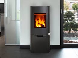 Anything seems possible by the light of a jøtul wood stove. Curve Wood Stove Heat Glo