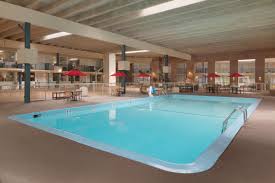 Ramada inn & conference centre cornwall features an indoor swimming pool with large windows overlooking the wooded courtyard and patio. Ramada By Wyndham Uniontown