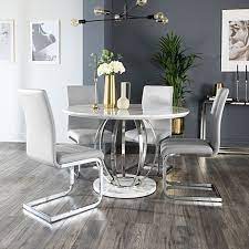 Tables in marble sets come in a variety of appealing styles, and those with pedestal bases are among the most popular options on ebay. Savoy Round White Marble And Chrome Dining Table With 4 Perth Light Grey Leather Chairs Furniture And Choice