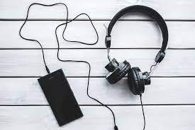 Free for commercial use no attribution required high quality images. Hd Wallpaper Black Smartphone And Headphones With Various Items Books Mobile Phone Wallpaper Flare