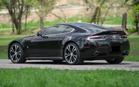 Image result for Jet Black 2011 Aston Martin