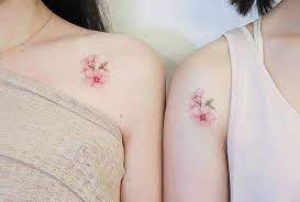 Flower tattoos are very popular in different kinds, sizes and colours. Friendship Tattoo
