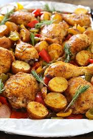 Rosemary Roasted Chicken With Bell Peppers And Potatoes Recipe Rosemary Roasted Chicken Chicken Drumstick Recipes Baked Chicken Legs