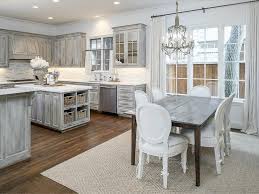 How To Diy Distressed Kitchen Cabinets Designalls In 2020 Distressed Kitchen Cabinets Kitchen Cabinets Decor Distressed Kitchen