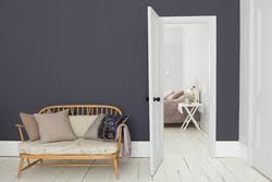 Even the sink boasts rounded edges to give this powder room a cohesive feel. Art Deco Sadolin Paint