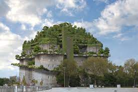 A bunker is a defensive military fortification designed to protect people and valued materials from falling bombs or other attacks. Gruner Garten Auf Grauem Bunker