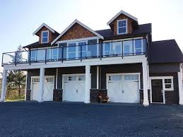 Carriage house plans generally refer to detached garage designs with living space above them. Garage Apartment Plans Carriage House Plan With 3 Car Garage 053g 0032 At Www Thegarageplanshop Com