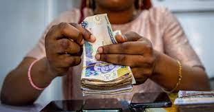 Nigeria Devalues Naira As Part Of Path To Single Exchange Rate Business And Economy News Al Jazeera