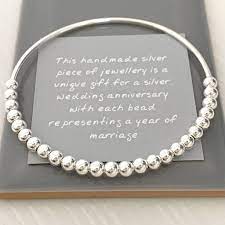 To help you find the perfect present, we've rounded up a range of traditional and modern 25th wedding anniversary gift ideas for you to browse below. 25th Silver Wedding Anniversary Gift Bangle By Handmade By Helle Notonthehighstreet Com