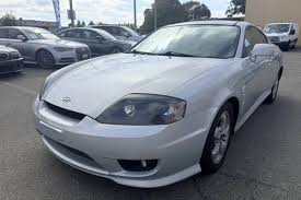 Image result for Bright Silver 2000 Tiburon