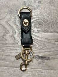 Coach mini skinny id key ring coin case signature wallet. Coach Leather Trigger Snap Bag Charm Valet Key Ring Fob In Gold Hardware Black Trigger Snap Bag Charm Color Black Gold R Snap Bag Bag Charm Coach Keychain
