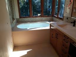 A new bath surround is a great way to upgrade your bathroom at a fraction of the cost. Tan Concrete Bath Tub Surround With Vanity Top