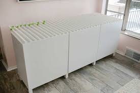 Add fade resistant runnen artificial grass tiles to give the kids or your pets a comfy play area. Fluted Ikea Besta Sideboard Hack A Beautiful Mess
