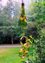 Black Bottle And Yellow Things Wind Chimes Made From Wine Bottles Black Eyed Susan Wine Etsy In 2020 Wind Chimes Wine Bottle Wind Chimes Ocean Flowers
