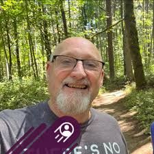 Republic, Washington celebrating July 4th, 1908 with a horse race Citizens  of Republic, Washington lined the main street for a horse race