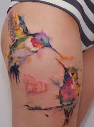 Hummingbird tattoos are one of favorite tattoo ideas for women although they may also be for men, depending on the style. Watercolor Two Hummingbirds Tattoo Tattooimages Biz