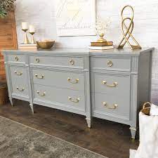 This makes it a comfortable choice for many when it comes to seating. Grey Painted Dresser With Gold Hardware Refurbished Furniture Gold Home Decor Furniture Makeover