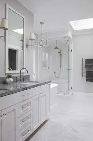 The charming spherical pendants with gray accents for lights give a luxuriant effect to the entire space. Pairing Dark Countertops With Light Cabinets For A Contemporary Style