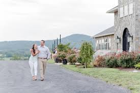 Situated on a hilltop with sweeping views of virginia farm country, blue valley is a wonderful spot to enjoy a wine tasting or an outdoor picnic. A Scenic Blue Valley Vineyard And Winery Engagement Session In Delaplane