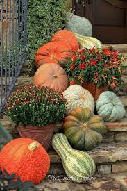 Decorating Your Garden With Pumpkins Fall Landscaping Autumn Decorating Pumpkin Display