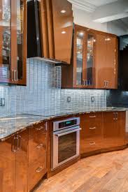 Renovated our kitchen with elmwood this spring.they have great pepole working there who really know their designs. Curved Wall Design Custom Cabinet Hood Elmwood Cabinetry Wood Print Black Slab Doors Diamond Gloss F Curved Kitchen Kitchen Wall Cabinets Kitchen Design
