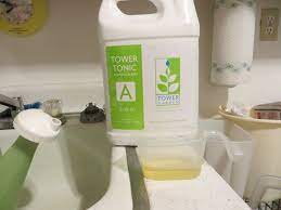 Water pump, timer, and drain tube. Weekly Maintenance Of The Tower Garden Enhancing Education Through Indoor Gardening Utilizing The Tower Garden By Juice Plus