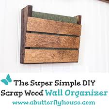 This reclaimed wood wall hook and vase would look great in an entryway. Super Simple Scrap Wood Wall Organizer A Butterfly House