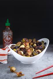 Brussels sprouts, trim ends only and leave whole olive oil salt and pepper. Honey Sriracha Roasted Brussels Sprouts