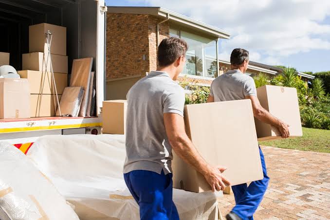 Professional moving truck and team loading protected household furniture in Mauritius