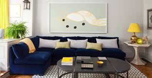 Minimalist Living Room Design With Dark Blue Sofa Jpg 1180 608 Blue Sofas Living Room Blue Sofa Living Blue Couch Living