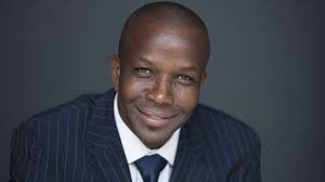 The ultimate in teamwork, determination, and guts; Jamaica's own Donovan  Bailey signs