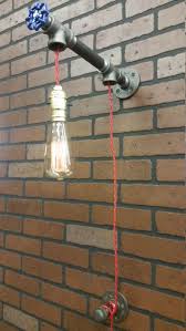 For a modern, luxurious look, try a wall light with a nice white marble bowl. Bathroom Diy Pipe Lamps Made With Recycled Taps Id Lights